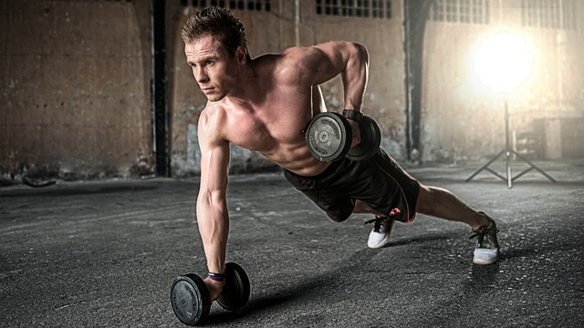 Athlete celebrating a personal best lift in a weightlifting competition.